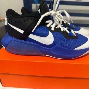 Brand new boys Nike basketball sneakers, never worn in box.